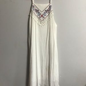 white summer dress with floral design on top